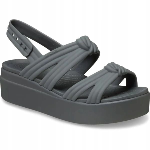Sandały Dla Dorosłych Crocs Brooklyn Knot Low Wedge Sandal. Brązowe sandały Crocs, bez wzorów, z materiału, eleganckie, bez obcasa, na koturnie, bez zapięcia. Za 289.99 zł.