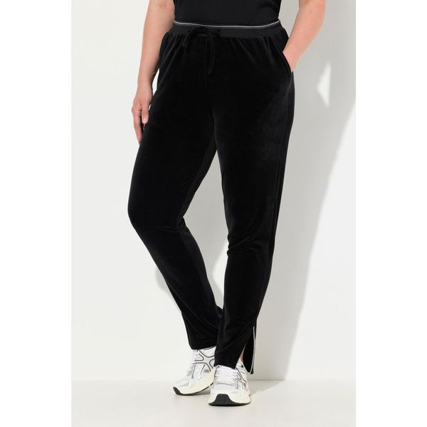 Damskie Aksamitne spodnie dresowe błyszcząca lamówka elastyczny pas kieszenie. Czarne spodnie dresowe Ulla Popken, plus size, bez wzorów, z dresówki. Za 244.99 zł.