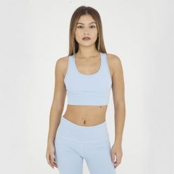 Crop top sportowy treningowy FEBE. Niebieskie bielizna sportowa LEGEA, s, bez wzorów, z materiału. W wyprzedaży za 84.50 zł.