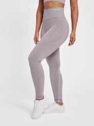 Legginsy damskie Hummel MT Flow. Fioletowe legginsy Hummel, s, bez wzorów, z dzianiny. Za 234.05 zł.