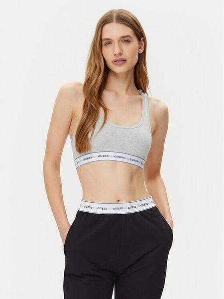 Guess Biustonosz top O97C01 KBBU1 Szary. Szare biustonosze Guess, l, z aplikacjami, z syntetyku, bez kołnierzyka, bez ramiączek. Za 79.99 zł.