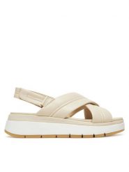 Clarks Sandały Tuscan Cross 26181470 Écru. Sandały Clarks, bez wzorów, ze skóry, bez obcasa, na płaskiej podeszwie, bez zapięcia. Za 379.99 zł.