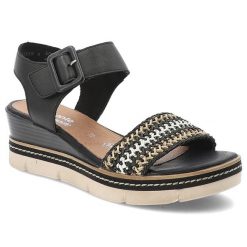 Czarne Sandały Remonte Stylowe Obuwie Damskie Na Koturnie. Czarne sandały Remonte, bez wzorów, eleganckie, bez obcasa, na koturnie, bez zapięcia. Za 369.00 zł.