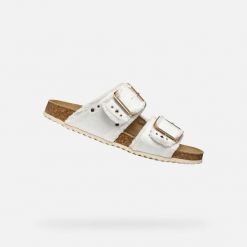 Sandały GEOX D BRIONIA R Biały. Brązowe sandały Geox, bez wzorów, bez obcasa, bez zapięcia. Za 400.99 zł.