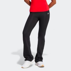 Legginsy fitness damskie ADIDAS flare. Czarne legginsy Adidas, s, bez wzorów, z bawełny, z podwyższonym stanem, długie. Za 119.99 zł.
