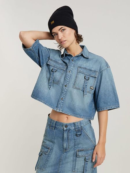 G-Star Bluzka dżinsowa w kolorze niebieskim rozmiar: M. Niebieskie bluzki G-Star, m, bez wzorów, z bawełny, retro, bez kołnierzyka, bez ramiączek. Za 187.96 zł.