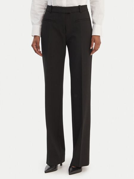 HUGO Spodnie materiałowe Hilayla 50555896 Czarny Slim Fit. Czarne spodnie materiałowe Hugo, bez wzorów, z materiału. Za 669.99 zł.