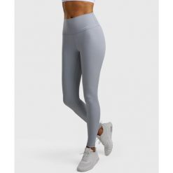 Legginsy sportowe damskie. Niebieskie legginsy NORDICDOTS, bez wzorów, z materiału, długie. Za 365.00 zł.
