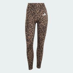 Legginsy Optime Essentials 3-Stripes Leopard 7/8. Brązowe legginsy Adidas, l, bez wzorów, z elastanu, z podwyższonym stanem. Za 219.00 zł.
