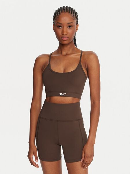 Reebok Biustonosz sportowy Reebok X Ewa Chodakowska RK25312CCW Brązowy. Brązowe bielizna sportowa Reebok, bez wzorów, z syntetyku, bez ramiączek, na fitness i siłownię. Za 149.99 zł.