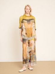 BGN Bluzka w kolorze kremowo-pomarańczowo-żółtym rozmiar: 36. Pomarańczowe bluzki BGN, bez wzorów, bez kołnierzyka, bez ramiączek. Za 217.99 zł.