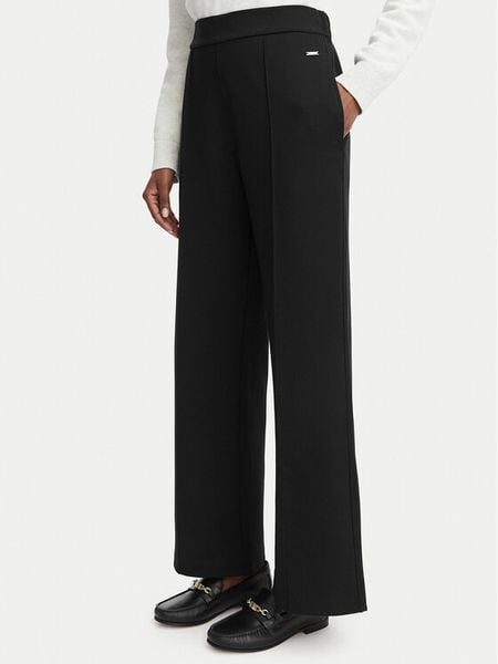 Calvin Klein Spodnie materiałowe LV044G210G Czarny Wide Fit. Czarne spodnie materiałowe Calvin Klein, s, bez wzorów, z materiału. Za 348.99 zł.