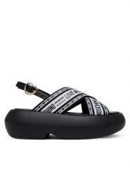 LOVE MOSCHINO Sandały JA16207I0MIX200A Czarny. Czarne sandały Love Moschino, bez wzorów, z materiału, bez obcasa, na koturnie, bez zapięcia. Za 569.99 zł.