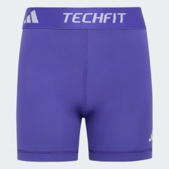 KRÓTKIE LEGGINSY TECHFIT. Białe legginsy Adidas, l, bez wzorów, z dzianiny, krótkie. Za 99.95 zł.
