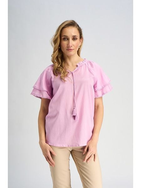 Marks & Spencer Bluzka w kolorze jasnoróżowym rozmiar: 42. Różowe bluzki Marks & Spencer, bez wzorów, bez kołnierzyka, bez ramiączek. Za 61.31 zł.