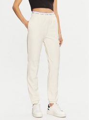 Guess Spodnie dresowe O5RB01 KCO31 Écru Regular Fit. Spodnie dresowe Guess, s, z aplikacjami, z bawełny. Za 179.99 zł.
