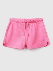 Benetton Szorty w kolorze jasnoróżowym rozmiar: 130. Różowe szorty Benetton, bez wzorów, z bawełny. Za 37.38 zł.