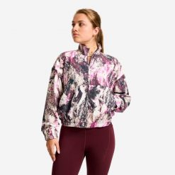 Bluza sportowa damska Domyos. Fioletowe bluzy DOMYOS, l, bez wzorów, z materiału, bez kaptura. Za 99.99 zł.