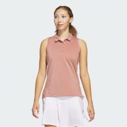 Koszulka Women's Ultimate365 Solid Sleeveless Polo. Czerwone koszulki polo Adidas, l, bez wzorów, z materiału, bez kołnierzyka, bez ramiączek. W wyprzedaży za 159.65 zł.