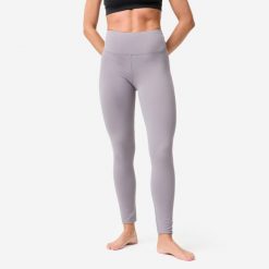 Legginsy do jogi i pilatesu Domyos. Fioletowe legginsy DOMYOS, l, bez wzorów, z elastanu. Za 119.99 zł.
