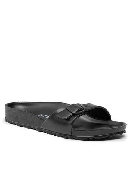 Birkenstock Klapki Madrit EVA 0128163 Czarny. Czarne klapki Birkenstock, bez wzorów, z syntetyku, bez obcasa. Za 209.99 zł.