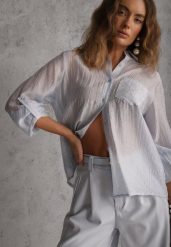 Niebieska Prześwitująca Koszula z Cyrkoniami Arialle. Niebieskie koszule Renee, l, bez wzorów, z jeansu, z asymetrycznym kołnierzem, bez ramiączek. Za 89.99 zł.