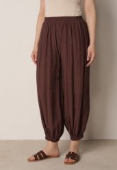 Brązowe Baloniaste Spodnie z Wysokim Stanem w Stylu Casual Lilanya. Brązowe spodnie materiałowe Born2be, do pracy, l, bez wzorów, z jeansu, z podwyższonym stanem, krótkie. Za 89.99 zł.