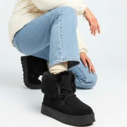 Śniegowce damskie Big Star, na wysokiej platformie z futerkiem i okrągłym noskiem, czarne, SS274113. Czarne botki Big Star, na zimę, bez wzorów, z okrągłym noskiem, bez obcasa, bez zapięcia. Za 135.99 zł.