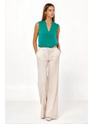 Nife Spodnie w kolorze beżowym rozmiar: 42. Brązowe spodnie materiałowe Nife, bez wzorów, z materiału. Za 140.20 zł.