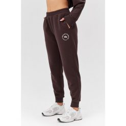 Damskie spodnie dresowe Rough Radical Cotton Active Joggers. Brązowe spodnie dresowe ROUGH RADICAL, s, bez wzorów, z dresówki, na fitness i siłownię. W wyprzedaży za 144.42 zł.