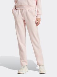 Adidas Spodnie dresowe w kolorze jasnoróżowym rozmiar: XL. Różowe spodnie dresowe Adidas, xl, bez wzorów, z dresówki. Za 162.87 zł.