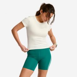 Koszulka fitness damska Domyos prążkowana. Białe bluzki DOMYOS, s, bez wzorów, z elastanu, sportowe, bez kołnierzyka, bez ramiączek. Za 69.99 zł.