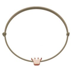 Bransoletka z koroną Etincelle, różowe pozłocenie, na cienkim sznurku w kolorze jasnego cappucino. Czerwone bransoletki Lilou, pozłacane. Za 79.00 zł.