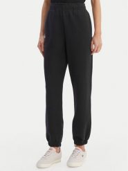 Lacoste Spodnie dresowe XF5244 Granatowy Regular Fit. Niebieskie spodnie dresowe Lacoste, bez wzorów, z bawełny. Za 609.99 zł.