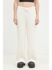 Adidas Spodnie dresowe "KNTD Jogger" w kolorze kremowym rozmiar: S. Brązowe spodnie dresowe Adidas, s, bez wzorów, z dresówki. Za 204.40 zł.