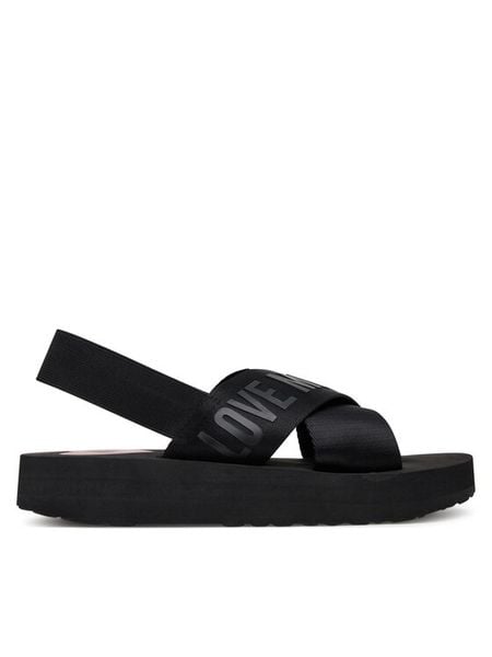 LOVE MOSCHINO Sandały JA16214G0MIX4000 Czarny. Czarne sandały Love Moschino, bez wzorów, z materiału, bez obcasa, na płaskiej podeszwie, bez zapięcia. Za 759.99 zł.