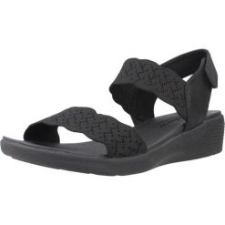 Sandały SKECHERS ARYA Czarny. Czarne sandały Skechers, bez wzorów, z materiału, bez obcasa, bez zapięcia. Za 390.00 zł.