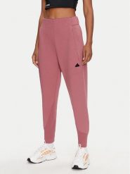 Adidas Spodnie dresowe Z.N.E. IW7771 Różowy Regular Fit. Czerwone spodnie dresowe Adidas, xl, bez wzorów, z dresówki. Za 379.99 zł.