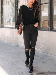 Milan Kiss Bluzka w kolorze czarnym rozmiar: M. Czarne bluzki Milan Kiss, m, bez wzorów, z koronki, bez kołnierzyka, bez ramiączek. Za 152.99 zł.