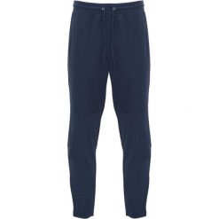 Spodnie Do Biegania Dla Dorosłych Unisex Neapolis. Niebieskie spodnie sportowe ROLY, na lato, bez wzorów, do biegania. Za 84.99 zł.