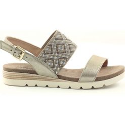 Żółte Caprice sandały buty damskie 28604. Żółte sandały Caprice, bez wzorów, ze skóry, eleganckie, bez obcasa, bez zapięcia. W wyprzedaży za 142.45 zł.
