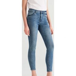 Jeansy slim fit z bawełny organicznej - Niebieski. Jeansy Reserved. Za 119.99 zł.
