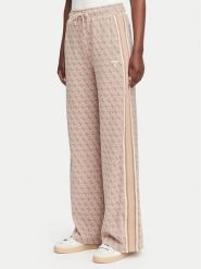 Guess Spodnie dresowe V6YB27 K5181 Beżowy Relaxed Fit. Brązowe spodnie dresowe Guess, xs, z aplikacjami, z dresówki. Za 474.99 zł.