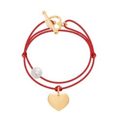 Bransoletka Lille pozłacana. Białe bransoletki Lilou, z perłą, pozłacane. Za 229.50 zł.