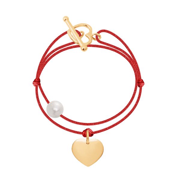 Bransoletka Lille pozłacana. Białe bransoletki Lilou, z perłą, pozłacane. Za 229.50 zł.