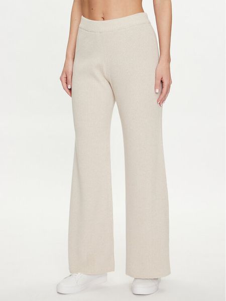 Pangaia Spodnie dzianinowe Recycled Cashmere Beżowy Regular Fit. Brązowe spodnie materiałowe Pangaia, l, bez wzorów, z dzianiny. Za 669.99 zł.