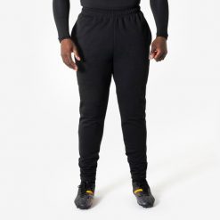 Spodnie piłkarskie Kipsta Essential. Czarne spodnie dresowe KIPSTA, xl, bez wzorów, z dresówki, na fitness i siłownię. Za 69.99 zł.