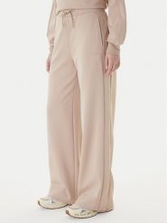 Guess Spodnie dresowe V5BB12 KCX22 Beżowy Regular Fit. Brązowe spodnie dresowe Guess, xxs, z aplikacjami, z dresówki. Za 479.99 zł.