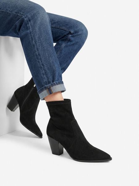 Nine West Botki EO-LBT805720-2 Czarny. Czarne botki Nine West, bez wzorów, z materiału, bez obcasa, na słupku, bez zapięcia. Za 329.99 zł.