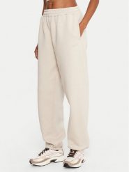 Reebok Spodnie dresowe Reebok X Ewa Chodakowska RK25304CCW Beżowy Regular Fit. Brązowe spodnie dresowe Reebok, l, bez wzorów, z dresówki. Za 179.99 zł.
